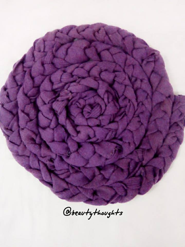 DIY rug using an old sweater/ towel